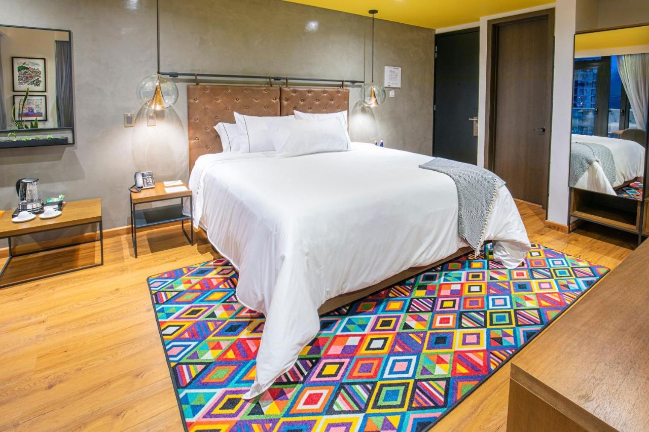 Hotel V1501 Pasto Exterior foto A carpet in a bedroom